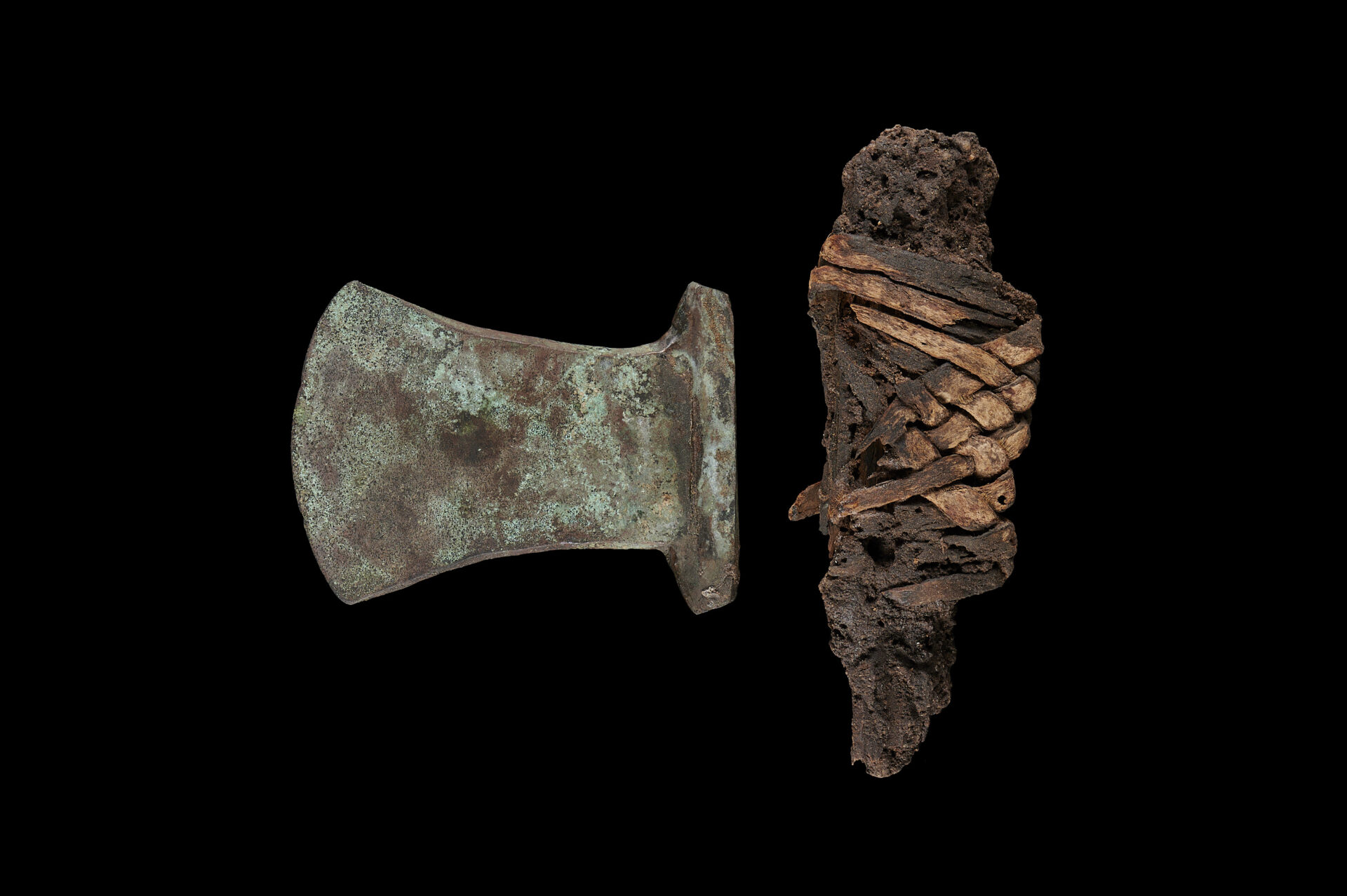 EGYPTIAN BRONZE AXE WITH FRAGMENT OF SHAFT